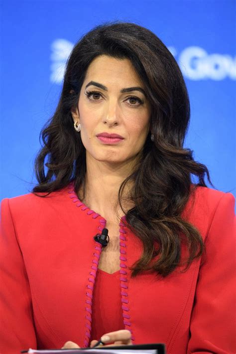 Amal Clooney Debuts New Look In Italy .